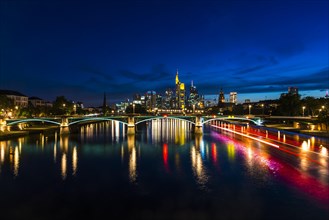 Illuminated Skyline and Ignatz Bubis Bridge at Blue Hour