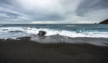 Coast with black sand beach