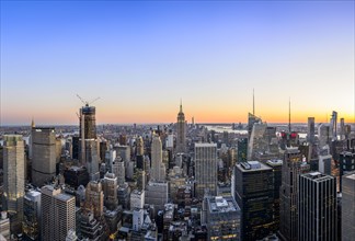 View of Midtown and Downtown Manhattan and Empire State Building from Top of the Rock Observation Center at sunset