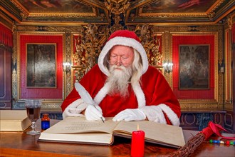 Santa Claus writes in book