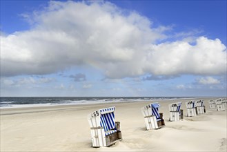 White-blue beach chairs on the beach