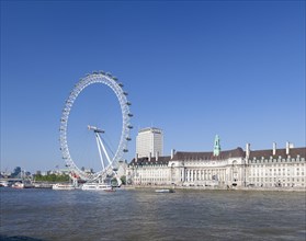 The London Eye and County Hall on the river Thames