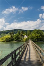 Wooden bridge crossing the Rhine River to the monastery island of Werd