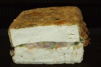 Two tofu slices filled with crushed