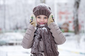 Girl with wool cap in winter