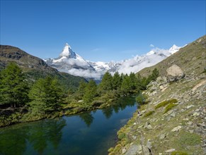 View over Lake Grindij with snow-covered Matterhorn