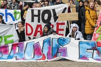 Students with banners at Climate Strike