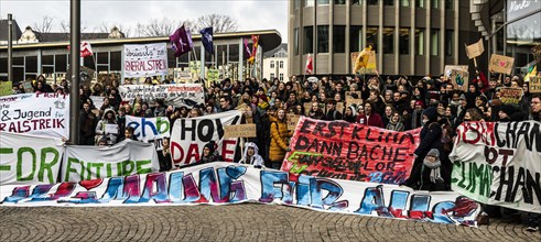 Students with banners at Climate Strike