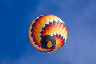 Colorful checker-patterned hot air balloon