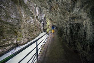 Young man in the Aareschlucht gorge in the Haslital