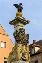 Baroque margrave fountain with Brandenburg eagle figure at the market place