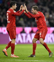 Goal celebration Thomas Mueller FC Bayern Munich with Robert Lewandowski FC Bayern