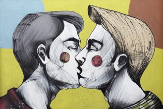 Two gay young men kissing