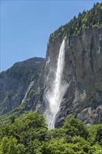 Staubbach Falls tumbling down from a high rock face