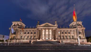 Reichstag with waving German flag