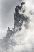 Bizarre mountain peaks with dramatic clouds