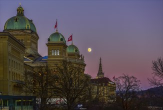 Federal House at dusk with Swiss flag and moon
