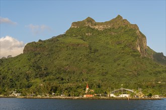 Village of Vaitape on the volcanic cone Mont Otemanu