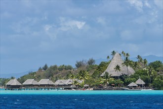 Water bungalows on turquoise water