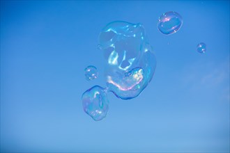 Soap bubbles with rainbow colours