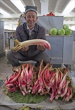 Native man sells rhubarb