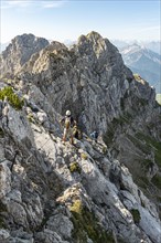 Mountaineer on a secured fixed rope route