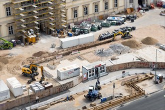Construction site with excavators from above
