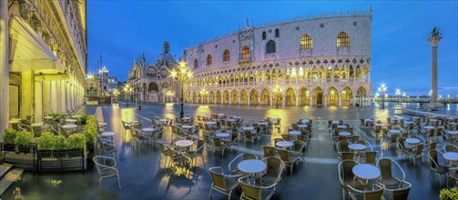 Restaurant at St. Mark's Square with Doge's Palace at night