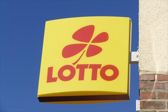 Sign with logo Lotto