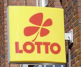 Sign with logo Lotto