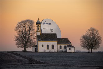 Chapel St. Johann with parabolic antenna at blue hour