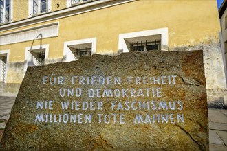 Reminder in front of the birthplace of Adolf Hitler