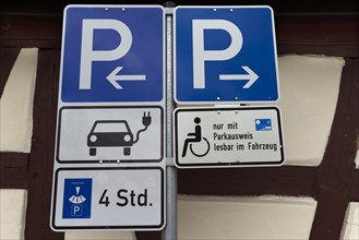 Parking signs for electric cars and disabled people