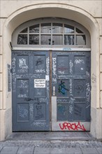 Graffiti on front door