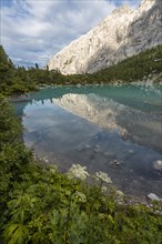 Mountain reflected in turquoise-green Sorapis lake