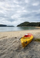 Kayak on the sandy beach of Anchorage Bay