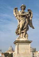 Angel statue and St. Peter's Basilica