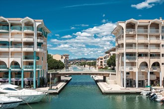 Marina of Port Frejus with the old town in the background