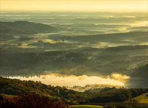 Stubenbergsee with autumn fog in the valley