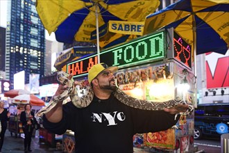 New Yorker gets photographed with Python
