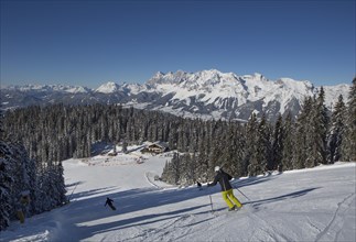 Ski area Planai with fairytale meadow hut and view to the Dachstein massif