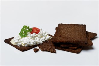 Pumpernickel slices topped with cream cheese