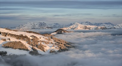 Mountain panorama with Kitzbuehler Horn and Loferer Steinbergen in winter