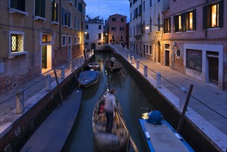 Gondolas in the evening in a side canal in the district of Dorsoduro