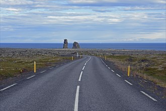 Country road leads to two bizarre rocky needles
