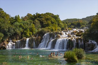Tourists bathing at the Skradinski Buk waterfall