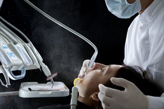 Dental treatment with aerosol cloud