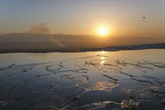 Sunset over the water terraces of Pamukkale