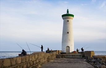 Fishermen at the lighthouse