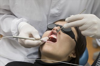 Dental treatment with laser